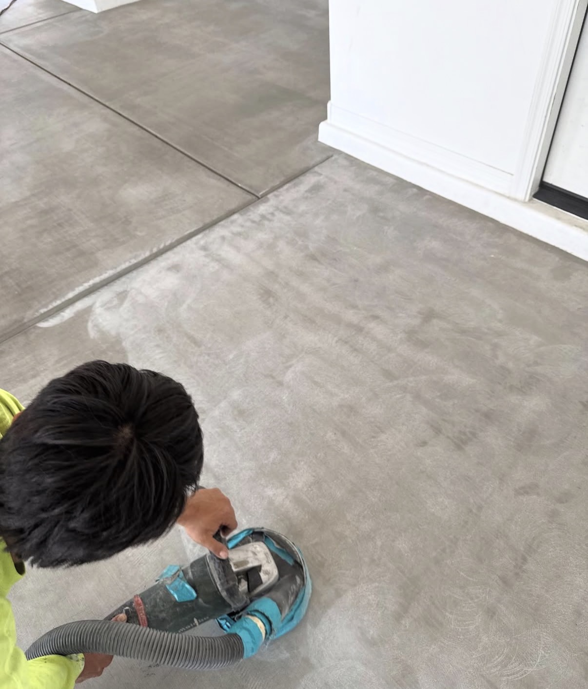 Concrete grinding and surface preparation for floor coating