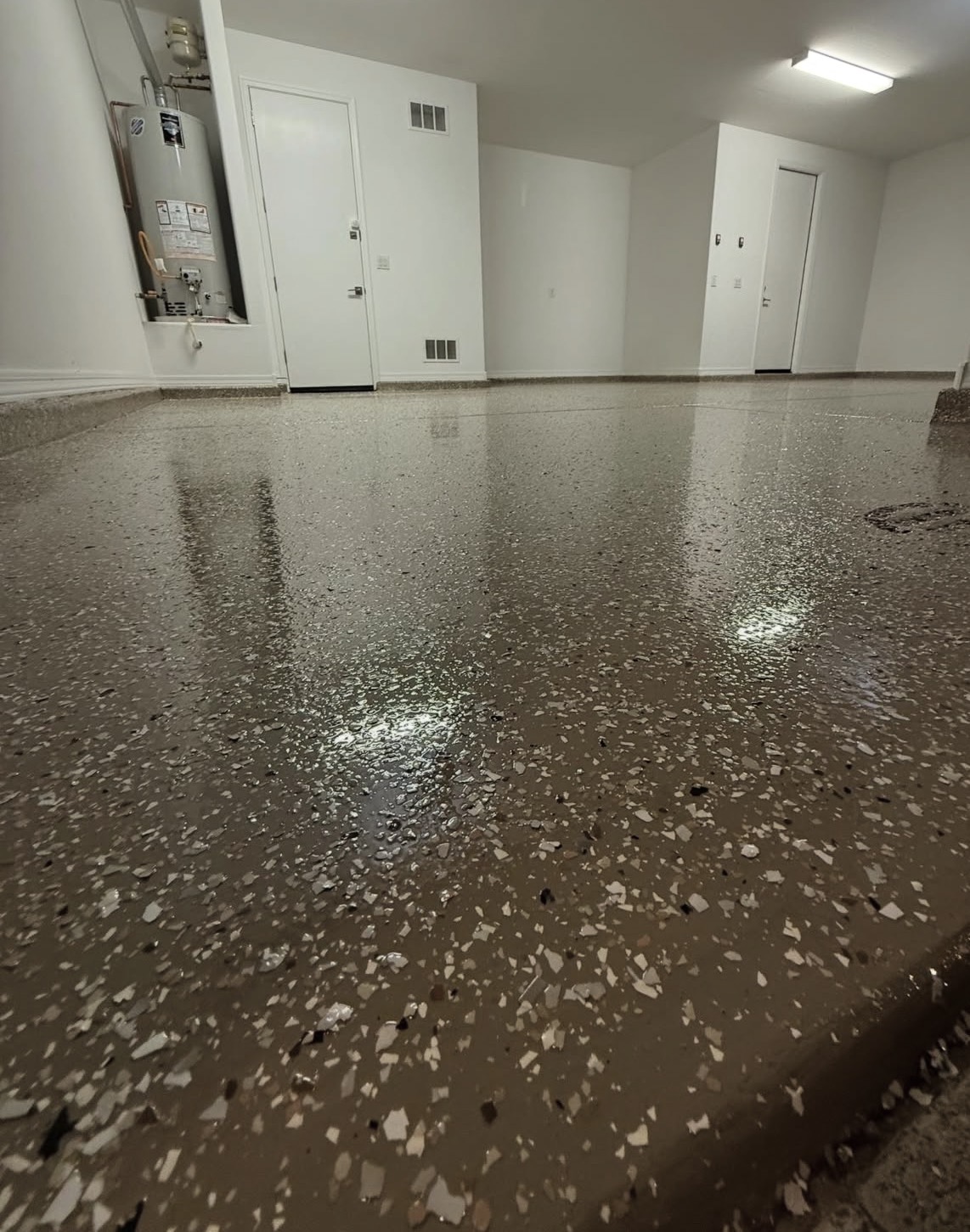 Tan decorative flake garage floor coating